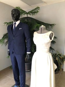 Formal-Blue-Suit-Vest-White-Shirt-Blue-Tie-Male-White-Embroidered-Female-Beaded-Wedding-Dress-Gown-Mannequins